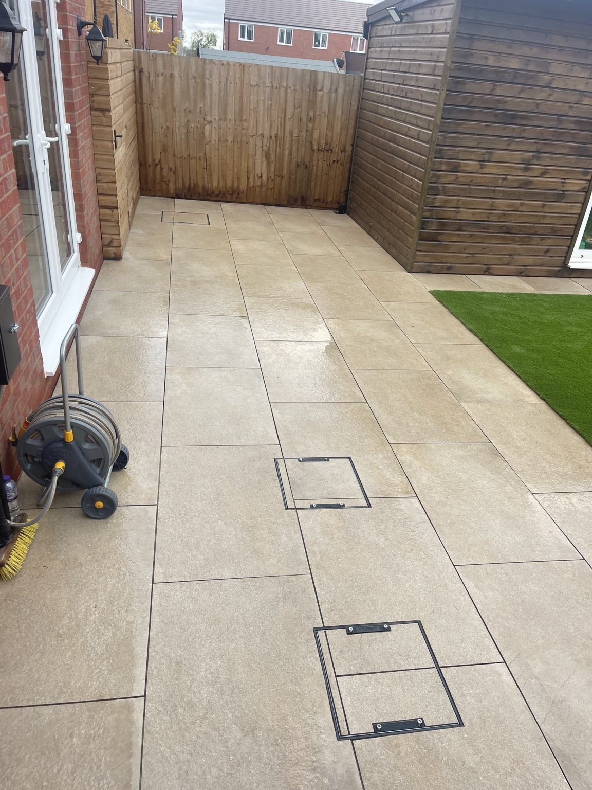 Paved route between the house and garden room